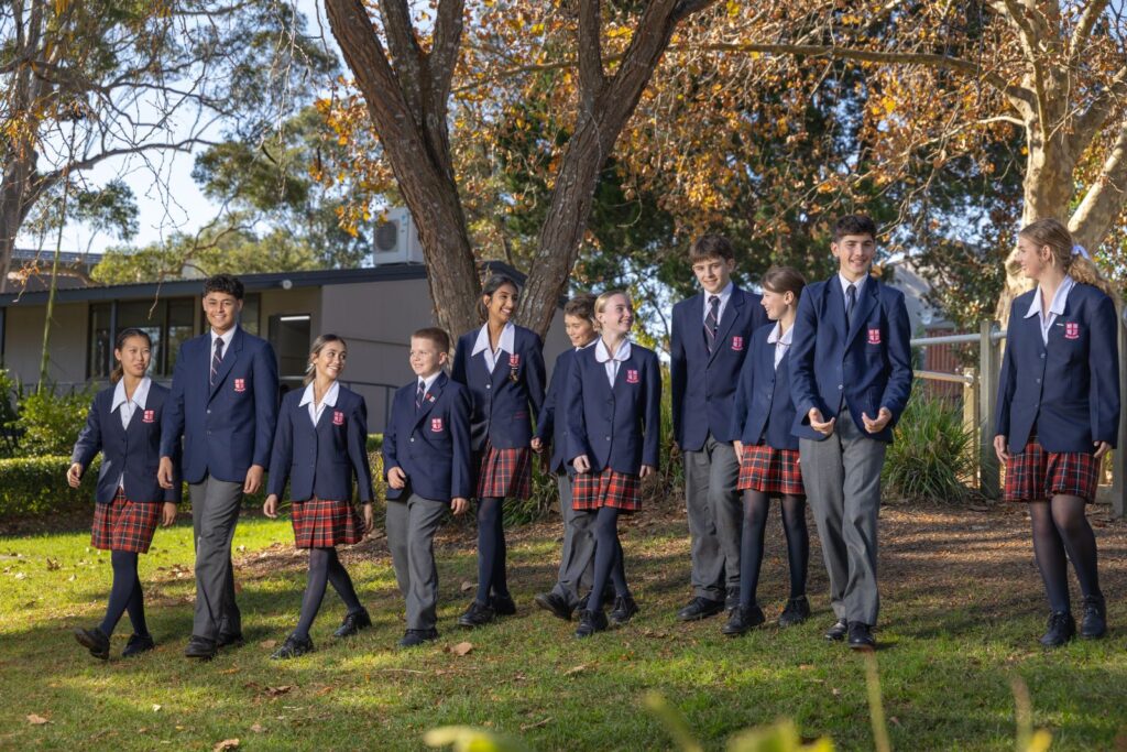 A group of eleven Northholm students, of varying ages, outdoors